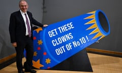 The Liberal Democrats Autumn Conference - Day Three<br>BOURNEMOUTH, ENGLAND - SEPTEMBER 25: Sir Ed Davey, leader of the Liberal Democrats, poses with a cann prop in the exhibition hall, at Bournemouth International Centre, at Bournemouth International Centre on September 25, 2023 in Bournemouth, England. The Liberal Democrats are the third largest political party by number of votes in the UK. Led by Ed Davey, MP for Kingston and Surbiton, they campaign on seven core values: liberty, equality, democracy, community, human rights, internationalism, and environmentalism. (Photo by Finnbarr Webster/Getty Images)