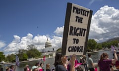 protester with a sign saying protect the right to choose