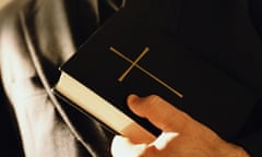 Man holding a Bible