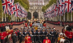 The coffin of Queen Elizabeth II is pulled past Buckingham Palace following her funeral service in Westminster Abbey earlier this month.