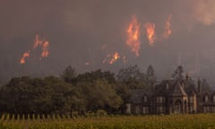 Flames rise behind Ledson Winery in October 2017 in Kenwood, near Santa Rosa, California. 