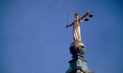 Justice statue on the Old Bailey law courts in central London