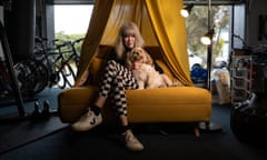 Vera Gazzard  holding her dog Missy near on a yellow couch in Torquay on Victoria’s Surf Coast