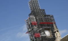 Scaffolding surrounds the Queen Elizabeth Tower, which holds the bell known as Big Ben.