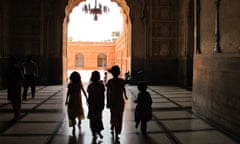 Stories from a young nation … a group of girls walks through Badshahi mosque.