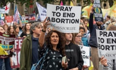 A protester holds a placard saying Pray to end abortion<br>LONDON, UNITED KINGDOM - 2021/09/04: A protester holds a placard saying Pray to end abortion during a protest in central London against abortions. Right to Life UK campaigns for the rights of unborn children and for a medical system and society where an increased support and practical care for women facing unplanned pregnancy. (Photo by Dave Rushen/SOPA Images/LightRocket via Getty Images)