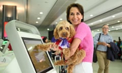 Virgin Australia CEO Jayne Hrdlicka poses with a dog