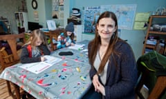 Emily Newland at home with her sons, William and Sebby