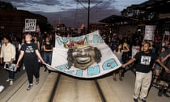 Protests Erupt After Minnesota Officer Acquitted In Killing Of Philando Castile<br>ST PAUL, MN - JUNE 16: Protestors carry a banner depicting Philando Castile on June 16, 2017 in St Paul, Minnesota. Protests erupted in Minnesota after Officer Jeronimo Yanez was acquitted on all counts in the shooting death of Philando Castile. (Photo by Stephen Maturen/Getty Images)