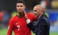 Portugal's Cristiano Ronaldo (left) with Portugal manager Roberto Martínez (right) after winning the penalty shootout.