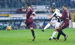 Gonzalo Higuaín scores his second goal for Juventus in the Turin derby against Torino.