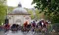 Riders pass the historic Royal Pump Room on the circuit at Harrogate that will be used in the upcoming UCI World Championships.