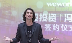 man with shoulder-length hair in a blazer over a t-shirt speaks