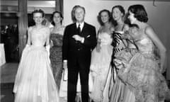 Dior And Models<br>25th April 1950: Fashion couturier Christian Dior (1905 - 1957), designer of the ‘New Look’ and the ‘A-line’, with six of his models after a fashion parade at the Savoy Hotel, London. (Photo by Fred Ramage/Keystone/Getty Images)