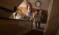 Carla Juri and Alec Secareanu in Amulet.