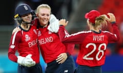 Sarah Glenn celebrates with Amy Jones and Danielle Wyatt after claiming a wicket against West Indies