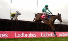Kempton Races<br>SUNBURY, ENGLAND - DECEMBER 26: Danny Mullins riding Tornado Flyer (green) clear the last to win The Ladbrokes King George VI Chase at Kempton Park on December 26, 2021 in Sunbury, England. (Photo by Alan Crowhurst/Getty Images)