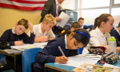 school children working in a classroom history class lesson