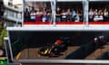 Fans watch as Max Verstappen passes by during qualifying for the Monaco GP.