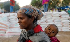 A mother and child queue for food in the Tigray region, Ethiopia.