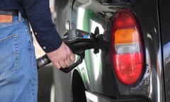 Man filling his car with fuel