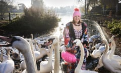 Feathered friends … Viv Goskrop in west London with a bank of swans. 