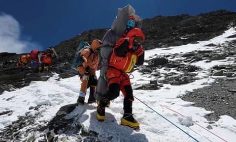 ‘We saved his life’: Nepali sherpa saves climber in rare rescue near Everest summit – video