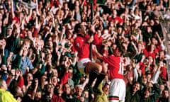 Eric Cantona celebrates scoring on his comeback.