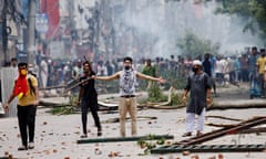 Protesters clash with guards in the street