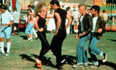 ‘Grease’ Film - 1978<br>No Merchandising. Editorial Use Only Mandatory Credit: Photo by c.Paramount/Everett / Rex Features ( 606229g ) ‘Grease’, Olivia Newton-John, John Travolta, Barry Pearl, Michael Tucci ‘Grease’ Film - 1978 