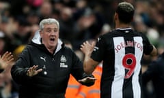 Joelinton ran to celebrate with Newcastle manager Steve Bruce after finally finding the net. 