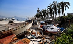 Boats washed up on the beach at Acapulco, Guerrero, Mexico, after Hurricane Otis struck the town.