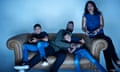 Romesh Ranganathan, his mother Shanthi and sons Theo (left) and Alex (right), sitting on a sofa, gaming