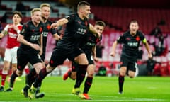 Tomas Holes wheels away after scoring a crucial away goal for Slavia Prague in injury time.