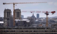 Cranes in front of Notre Dame Cathedral in Paris