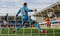 Hull City's Adama Traoré scores their second goal against Millwall at the Den.