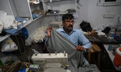 Muhammad Razzaq works in his shop in Islamabad