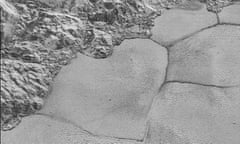 This handout picture obtained from NASA on December 5, 2015 shows an image taken from NASA's New Horizons spacecraft showing great blocks of water-ice crust jammed together in the informally named al-Idrisi mountains on the planet Pluto.  
The US space agency has released a series of sharp Pluto snapshots, billing them as the best close-ups of the dwarf planet we may see for decades.   / AFP / NASA / HO / RESTRICTED TO EDITORIAL USE - MANDATORY CREDIT "AFP PHOTO / HANDOUT / NASA" - NO MARKETING NO ADVERTISING CAMPAIGNS - DISTRIBUTED AS A SERVICE TO CLIENTS  
 
HO/AFP/Getty Images