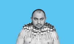 Etibar Elchiyev poses with 50 metal spoons magnetized to his body during an attempt to break the Guinness World Record for "Most spoons on a human body" in Tbilisi