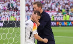 Joshua Kimmich is consoled after the game by Julian Nagelsmann.