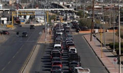 Vehicles queue to cross into the city of El Paso on the Mexico side of the Bridge of Americas on 3 November 2020.