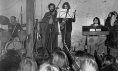 Photo by: Sovfoto/Universal Images Group via Getty Images. Plastic People of the Universe performing at Hradecek Cottage that belonged to playwright Vaclav Havel in 1977.