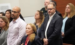 Parkland school shooter Nikolas Cruz capital murder trial<br>epa10239074 Kelly Petty (C) and Ryan Petty (2-R) are shown as family members of the victims stand while the jury enters the courtroom for jury instructions in the penalty phase of the trial of Marjory Stoneman Douglas High School shooter Nikolas Cruz at the Broward County Courthouse in Fort Lauderdale, Florida, USA on Wednesday, 12 October 2022. Cruz previously plead guilty to all 17 counts of premeditated murder and 17 counts of attempted murder in the 2018 shootings. EPA/Amy Beth Bennett / POOL