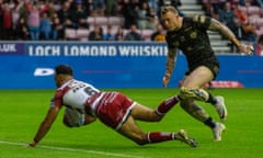 Wigan's Bevan French dives in to score the first of his two tries