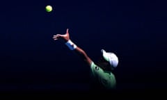 Brandon Nakashima serves during his first round match against Italy's Matteo Berrettini.