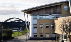 A building at the University of Sunderland's St Peter's campus, with the Tyne Bridge in the background