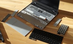 Framework Laptop 16 showing its exposed top deck and various modules.