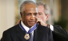 Frank Robinson receiving the Presidential Medal of Freedom from George W Bush in 2005