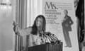 Editor Gloria Steinem Attending a News Conference<br>(Original Caption) Gloria Steinem, an editor of Ms. Magazine, at a news conference at the National Press club December 16th, says that President Carter's first year in office has been disappointing. She said that there is hope for improvement because of his stated commitment to women's rights. in the background is a big reproduction of the conver of the magazine's January issue. It features an image of a smiling and very pregnant "Carter."