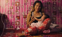 Maria Margarette Villorente with baby Vinice at home in Manila